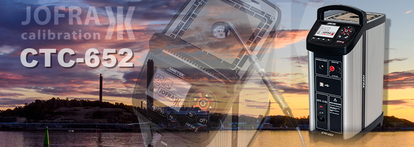 Technician calibrating a long temperature sensor using a JOFRA CTC-652 dry-block calibrator.